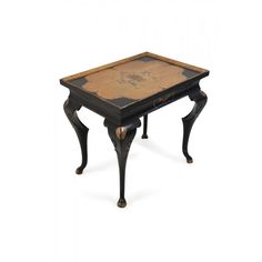 a small table with an old world map on it's top and two legs