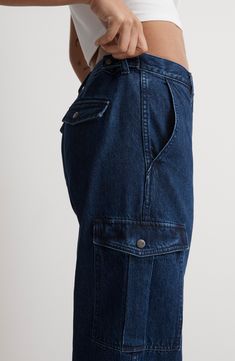 Designed to be slung low, these slouchy straight-leg jeans have workwear-inspired cargo pockets. Blended with recycled cotton, the denim has old-school character with zero stretch. Zip fly with button closure Front slant pockets; back button-flap pockets; cargo flap-patch pockets 95% cotton, 5% recycled cotton Machine wash, tumble dry Imported Straight Denim Blue Bottoms With Pockets, Urban Straight Bottoms With Pockets, Straight Leg Jeans With Flap Pockets For Work, Baggy Cargo Jeans For Work, Dark Wash Cargo Jeans With Patch Pockets, Medium Wash Straight Bottoms With Pockets, Baggy Utility Cargo Jeans For Workwear, Utility Dark Wash Jeans With Patch Pockets, Dark Wash Utility Jeans With Patch Pockets