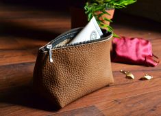 "Perfect size pouch bag made from high quality pebbled leather. Use as a super cute little clutch, a small makeup case, or to organize items in your larger bag. * Highest quality Italian leather * Silver zipper * Unlined interior Dimensions: Height: 3.5'' 9 cm Width: 6.3\" 16 cm Depth: 2.4\" 6 cm Color may vary depending upon monitor. If you are interested in bags in different size do not hesitate to contact me. I can make a bag special for you from leather you will choose. THIS BAG IS MADE TO O Makeup Bag Leather, Leather Pouches, Brown Leather Clutch, Leather Cosmetic Bag, Leather Makeup Bag, Leather Toiletry Bag, Small Leather Bag, Leather Wear, Brown Bags