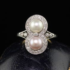 Beautiful Antique Edwardian 18K Yellow Gold Platinum Natural Pearl Toi et Moi Ring - GIA. This incredible Toi et Moi ring is crafted in 18k yellow gold and platinum top. The ring holds natural pearls that have a GIA report. The pearls are surrounded by natural old cut diamonds that are white and have beautiful sparkle to them. The ring sits low on the finger and has a gorgeous and delicate look. Item #R1809 Metal: 18K Yellow Gold and Platinum Weight: 4.8 Grams  Size: 7 1/2 Pearls: 6.3 mm wide - Exquisite Yellow Gold Diamond Ring With 17 Jewels, Luxury Pearl Ring With Rose Cut Diamonds For Anniversary, Exquisite Multi-stone Platinum Diamond Ring, Exquisite Multi-stone Diamond Ring In Platinum, Exquisite Yellow Gold Multi-stone Diamond Ring, Yellow Gold Diamond Pearl Ring, Oval Shape, Yellow Gold Oval Diamond Pearl Ring, Heirloom Yellow Gold Multi-stone Diamond Ring, Elegant Multi-stone Platinum Jewelry