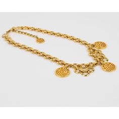 This elegant Louis Feraud Paris choker necklace features a romantic chain-necklace shape with gilded ornate iconic brand logo charms. The necklace closes with a lobster closing clasp and an extra chain gives length flexibility to the necklace. Another Feraud brand logo is attached to the chain extension.  Measurements: The necklace's total length is 20.08 in (51 cm) - width is 1.44 in wide (3.6 cm)  Please see the measurements noted above in the description for the best approximate dimensions. Gold-tone Metal Necklace With Logo Plaque, Yellow Gold Chain Link Jewelry With Gold-tone Logo, Gold Metal Necklaces With Gold-tone Logo Plaque, Gold Chain Necklace With Gold-tone Logo, Gold Chain Necklace With Logo Plaque, Elegant Gold-tone Chain Link Jewelry With Logo Plaque, Elegant Gold-tone Chain Link Jewelry, Luxury Metal Necklaces With Gold-tone Logo Plaque, Vintage Gold Necklace With Gold-tone Logo Plaque