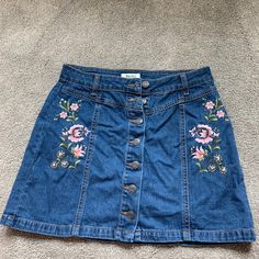 So Cute And Springy!! Stand Out With Unique Embroidery That Looks Brand New! Casual Denim Skirt With Floral Embroidery, Casual Embroidered Denim Skirt, Spring Embroidered Denim Skirt, Embroidered Medium Wash Denim Skirt, Casual Embroidered Denim Blue Skirt, Casual Blue Skirt With Floral Embroidery, Spring Embroidered Medium Wash Denim Skirt, Embroidered Denim Skirt In Blue, Blue Embroidered Denim Skirt