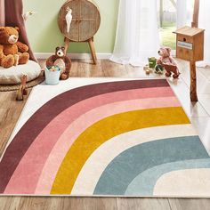 a child's room with teddy bears and rugs on the floor, including a rainbow rug