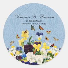 a bouquet of flowers on a blue background with butterflies in the sky and below it is an address sticker