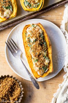 stuffed squash with cheese and herbs on a plate