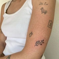 a woman with tattoos on her arm