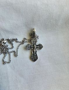 A beautiful Orthodox cross with an inlaid crucifixion of Jesus Christ. Available in oxidized silver and 14K gold plated silver. It has a silver mark of quality. material: silver sample 925 plating: 14K gold Pendant Height: 3.5cm / 1.38inch pendant width: 2.0cm / 0.79inch Hanging hole size: 3 mm. x 5.5 mm. necklace length: 45 cm / 17.72 inches Locket Necklace Weight: 4.1 grams of genuine solid silver Due to the hand-crafting of the crosses, there is a slight difference in weight from 0.2 grams to Orthodox Cross Necklace, Cross Gold, Orthodox Cross, Cross Jesus, Jesus Christus, Jesus On The Cross, Sterling Silver Cross, Gold Cross, Silver Cross