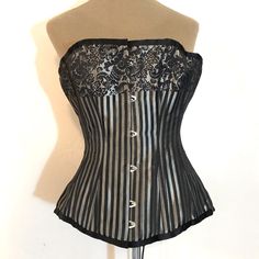 New With Tag! Retail $95 Super Sexy Metal Boned Bustier This Beauty Is No Joke She's Beautifully Made! Black & Silver Vertical Stripes Black & Silver Complimentary Floral Pattern Real Metal Boning Enhances The Feminine Shape For Sure! This Is A True Bustier Fully Adjustable Lace Up Back - Fits Almost Anyone! Shiny Silver Rear Grommets 6 Front Silver Metal Closures Perfect For A Burlesque Show, A Great Costume Or A Very Sexy Night In! Pink Mesh Top, Burlesque Corset, Burlesque Show, Red Sports Bra, Floral Two Piece, Corset Bustier, Pink Bra, Vertical Stripes, Shiny Silver