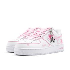 a white and pink nike air force low top sneaker with minnie mouse on the side