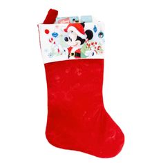 a red christmas stocking with mickey mouse on it