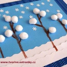 this is an image of a winter scene made out of paper with snow on the branches