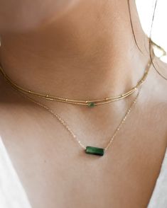 𝗘𝗮𝘀𝘆 𝗧𝗼 𝗦𝘁𝘆𝗹𝗲, 𝗠𝗮𝗱𝗲 𝗧𝗼 𝗟𝗮𝘀𝘁 Our dainty jade gemstone necklaces are easy to layer and ready to be worn on repeat. Created to last a lifetime, these necklaces will remain evergreen even as the years and trends come and go! - Small rectangle stone measures 4mm - Small round stone measures 5mm - Large rectangle stone measures 13mm - Large rectangle stone measures 13mm  Looking for a specific shade of stone? You may request this in the "note to seller" box at checkout! We will do Dainty Gold Jade Necklace, Delicate Green Necklace For Everyday Wear, Delicate Necklace With May Birthstone, Dainty Green Jewelry With Delicate Chain, Minimalist Jade Gemstone Jewelry, Green Delicate Chain Jewelry For Everyday, Gemstone Double Strand Necklace, Dainty Necklaces With Natural Stones For Layering, Double Strand Gemstone Necklace For Layering