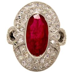 A Breathtaking Vintage 18K White Gold (tested) Elongated Oval Ruby ring. CIRCA 1940s. The RUBY is estimated 3.50CT with measurements of 14.65x7.80x3.35 mm. GIA Certified in Dark beautiful Transparent Red color, Natural with some small imperfections and treatments such as heating and fracture filling, common for most rubies, all indicated on the GIA report, Bezel set. Beautiful Deep Red Color is perfectly accented by 2 rows of Near-colorless G-H, VS-SI clarity Old Single cut Diamonds. Estimated t Oval Ruby Ring, Vintage Cluster Ring, Jewellery Store, Jade Ring, Ruby Jewelry, Deco Jewelry, Art Deco Diamond, Vintage Jewels, Ruby Diamond