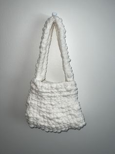 Handmade crochet shoulder bag made out of soft fluffy yarn. Small but mighty! Can fit your phone, wallet, and any other necessities! I can make the same style bag in other colors so feel free to message me.  Length of the bag is 19in including the shoulder strap, and 10in wide! Feel free to message me with any questions you may have! Fluffy Yarn, Crochet Shoulder Bag, Chunky Yarn, Same Style, Phone Wallet, Handmade Crochet, Bag Making, Making Out, Purses And Handbags