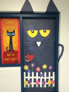 a door decorated to look like a cat