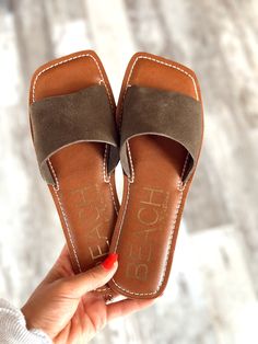 Classic one-band slide sandal with squared off toe. Details: Suede upper.Manmade outsole.Synthetic leather lining.Padded insole.Imported.Please note: due to the nature of the leathers used on this style, each pair will look similar but not identical to the one pictured. These are considered natural variances and part of the intended look. Saint West, Graphic Tee Dress, Dear John, Flying Monkey, Girl Jewelry, Spray Tanning, Boot Accessories, The Nature, Cami Tanks