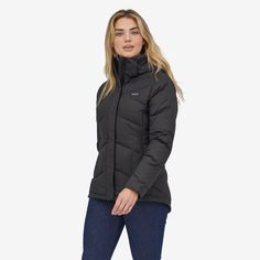 This jacket has a 100% recycled polyester shell and a removable, insulated hood, and is insulated with 600-fill-power 100% Recycled Down (duck and goose down reclaimed from down products). Made in a Fair Trade Certified™ factory. - Black Patagonia Jacket Women, Mountain Biking Women, Feminine Silhouette, Princess Seams, Princess Seam, Patagonia Womens, Hip Length, Fair Trade, Down Jacket