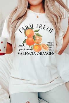 Dive into summer with farm-fresh valencia oranges, indulge in the softness of a Comfort Colors t-shirt. Whether paired with shorts for a beach day or dressed up with a skirt for a sunset soirée, this summer staple exudes both comfort and farmcore flair. 𝔻𝔼𝕋𝔸𝕀𝕃𝕊 Comfort Colors 1717 T-Shirt 💗Fabric content: 100% Cotton 💗Feel: luxe thick garment-dyed cotton 💗Fit: oversized unisex fit - Models are wearing XL Gildan 5000 T-Shirt 💗Fabric content: 100% Cotton; heathered colors have added polyester 💗Feel: tubular jersey knit cotton 💗Fit: standard unisex fit - Models are wearing L ➡️Direct to Garment Printing uses ink jet technology to spray ink onto garments for a strong bond between the ink and fibers. ➡️Kindly note that colors, contrast, textures and positions of graphics can slight Farmers Market Graphic, Organic Short Sleeve T-shirt For Spring, Peach Short Sleeve T-shirt For Summer, Peach Short Sleeve Shirt For Summer, Casual Peach Summer Shirt, Summer Peach Cotton Shirt, Peach Cotton Summer Shirt, Orange T-shirt For Spring And Summer, Summer Cotton T-shirt For Brunch