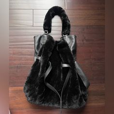 Stylish Genuine Leather Black Purse, Made In Spain. Great Condition. Unique Style. Comfortable, Stylish And Has Lost Of Space. Leather Evening Bags For Winter, Chic Evening Shoulder Bag With Faux Fur Lining, Elegant Evening Shoulder Bag With Faux Fur Lining, Elegant Evening Bags With Faux Fur Lining, Luxury Black Shoulder Bag For Winter, Leather Bag With Faux Fur Lining, Chic Leather Bags For Winter, Black Leather Shoulder Bag For Evening With Leather Backing, Black Leather Evening Shoulder Bag