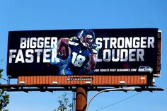 an advertisement for the nfl football team is displayed on a billboard in front of a blue sky