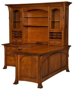 a wooden desk with drawers and cupboards