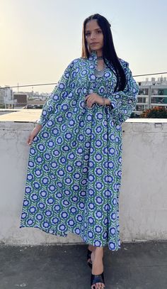 "DESCRIPTION gorgeous green blue flower fan printed maxi dress / Henley neckline boho maxi dress / 34th sleeve with buttons maxi dress Indian (Jaipur) Traditional Hand Block Printed Dresses for summer vacations, beaches wear, party wear, and more occasions to wear this dresses. PRODUCT DETAILS: 3/4th sleeve, Henley neck, Long dress FABRIC: soft and breathable cotton cambric WASH CARE:  wash in cold water, air dry in shade.. SLEEVE LENGTH - 18 inch Size chart is mentioned in images. Size chart is Modest Green Spring Maxi Dress, Floor-length Green Maxi Dress With Floral Print, Modest Green Flowy Maxi Dress, Green Floor-length Floral Maxi Dress, Green Floral Print Maxi Kaftan, Modest Green Floral Print Dress, Green Floral Print Long Sleeve Maxi Dress, Modest Maxi Length Kaftan For Spring, Modest Maxi-length Kaftan For Spring