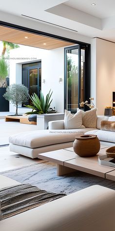 a living room filled with furniture and a fire place in front of a sliding glass door