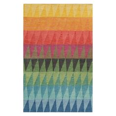 a multicolored rug with triangles on it