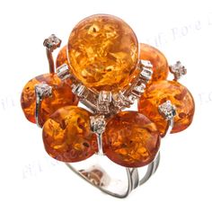 "Sparkling 925 Sterling Silver Simulated Amber Cz Cocktail Ring Width: 35mm(1 1/4\") 925 Sterling silver, Simulated amber, Cubic Zirconia Price: 74.95" Luxury Round Amber Jewelry, Fine Jewelry Amber Jewelry For Anniversary, Amber Jewelry With Prong Setting For Anniversary, Luxury Amber Sterling Silver Rings, Luxury Amber Ring Jewelry, Luxury Amber Rings, Fine Jewelry Amber Topaz Ring, Amber Rings With Prong Setting Fine Jewelry, Amber Rings With Prong Setting In Fine Jewelry Style