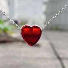 Made from Natural Garnet. This Heart Necklace is suitable for January Birthstone Gift. The Garnet Pendant has a silver core. You can use it as a charm bead for Trollbeads bracelet. Detail: > Natural Garnet > Heart Shape. > 18” silver chain > Size : 12mm x13mmx8,4mm — #garnet #gemstonejewelry #heart #necklace #january #redheart #charms Red Sterling Silver Heart Bead Necklace, Red Sterling Silver Heart Necklace With Beads, Red Sterling Silver Heart Pendant Necklace, Red Heart Pendant Necklace In Sterling Silver, Red Heart-shaped Sterling Silver Necklace, Red Sterling Silver Heart Necklace As Gift, Red Sterling Silver Necklace With Heart Pendant, Red Sterling Silver Heart Charm Necklace, Red Heart Cut Sterling Silver Necklace