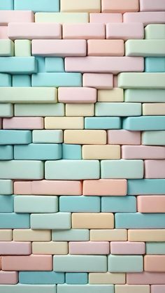 a wall made up of pastel colored bricks