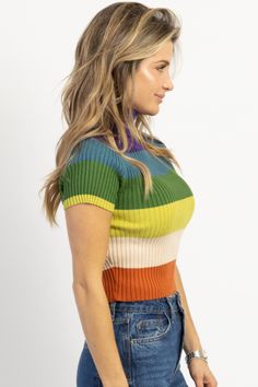 *SIGN UP FOR RESTOCK NOTIFICATIONS, ITEMS ARE RESTOCKED WHEN POSSIBLE BASED ON DEMAND* DESCRIPTION 55% Viscose, 30% Polyester, 15% Nylon Mock neckline, Ribbed, Multicolor stripes, Fitted with stretch Naomie is wearing a size small Height | 5'8 Dress size | 2 Please note: All items purchased on sale are final sale. We recommend checking your cart for sale items to make note of non-returnable items Trendy Fitted Ribbed Mock Neck Top, Green Knit High Neck Top, Green High Neck Knit Top, Green High-neck Knit Top, Trendy Fitted Striped Knit Top, Casual Color Block Turtleneck Top, Retro Ribbed Striped Tops, Retro Striped Ribbed Tops, Retro Color Block Knit Tops