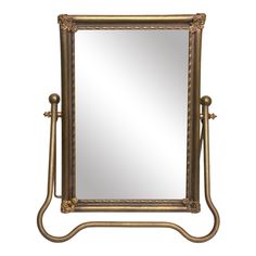 a large mirror sitting on top of a metal stand with an ornate frame around it