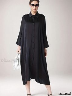 Olivia Mark - Vestido camisero con cuello vuelto y manga murciélago de satén sólido con botones, confeccionado profesionalmente a medida para mujeres de tallas grandes Oversized Long Sleeve Shirt Dress In Solid Color, Oversized Long Sleeve Solid Color Shirt Dress, Oversized Solid Color Long Sleeve Shirt Dress, Oversized Button-up Solid Color Dress, Oversized Solid Color Button-up Dress, Oversized Long Sleeve Shirt Dress For Office, Black Relaxed Fit Button-up Shirt Dress, Oversized Shirt Dress With Buttons, Solid Oversized Shirt Dress For Work