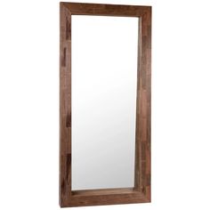 a mirror that is sitting on top of a wooden frame with a white wall in the background