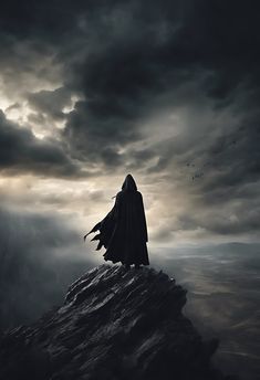 a person standing on top of a rock under a cloudy sky