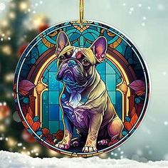 a dog ornament hanging on a christmas tree in front of a stained glass window