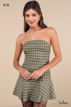 Chic meets adorable when it comes to the Motel Hadia Yellow Plaid Strapless Drop Waist Mini Dress! Lightweight woven fabric, with a glen-style plaid pattern (in hues of grey, yellow, and black), shapes a straight neckline (with hidden no-slip strips) and a fitted, strapless bodice. Princess seams run down the figure-skimming silhouette that meets a fluttery skirt with a drop waist design and a flirty mini hem. Elastic at back for fit and hidden side zipper. Fit: This garment fits true to size. L Yellow Plaid Dress, Black Shapes, Glen Plaid, Adhesive Bra, Straight Neckline, Yellow Plaid, Princess Seams, Plaid Fashion, Strapless Mini Dress