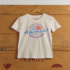 Make a statement at your next July 4th barbecue with this bold t-shirt that celebrates America’s freedom and honors the brave making it a must-have for any patriotic collection. .: The Comfort Colors 1717 tee is made with medium fabric (6.1 oz/yd² (206.8 g/m²)) consisting of high quality, 100% ring-spun US cotton for long-lasting comfort..: The relaxed fit keeps the wearer comfy in both casual and semi-formal settings while the crew neckline delivers that classic, neat style which makes it perfe Made In Usa Crew Neck T-shirt For Veterans Day, American Style Flag Print T-shirt For 4th Of July, Patriotic Made In Usa T-shirt For Memorial Day, Patriotic T-shirt Made In Usa For Memorial Day, Patriotic T-shirt For Memorial Day, Made In Usa, American Style T-shirt With American Flag For Independence Day, Americana Crew Neck T-shirt For 4th Of July, 4th Of July American Flag Print T-shirt, Labor Day Crew Neck T-shirt Made In Usa