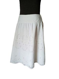 This is a vintage A-line white summer skirt, made of 100 % linen, with cut out embroidery and embroidered waistband. Casual, yet elegant skirt, comfortable and beathy, closes with a zipper on the left side, fully lined with 100% cotton fabric. The lable with the size is missing, so please check the exact dimensions below, taken flat. waist - 39 cm/ 15.4 in hansh - 48 cm/ 18.9 in length - 67 cm/ 26.4 in This skirt would suit a size - M/L Condition: very well preserved, no stains, no tears Shippin White Cotton A-line Maxi Skirt, White A-line Cotton Maxi Skirt, White Relaxed A-line Skirt, White A-line Skirt, White A-line Skirt For Summer, White Broderie Anglaise Cotton Skirt, White Cotton Skirt With Broderie Anglaise, White A-line Lined Skirt, White Full Skirt For Summer