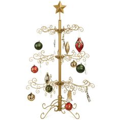 a gold christmas tree with ornaments hanging from it's sides and a star on top