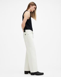 Loosen up with the Lenny Jeans. A new fit around here, they're wide in the leg with straight shaping offering ease and versatility to the fit. The organic cotton fabric takes its construction cues from grunge-inspired silhouettes for an authentic, but elevated take. Complete with five pockets, the Lenny are an instant classic that lend well to smarter dressing as well as casual days.   In honor of our 30th anniversary, we've relaunched the AllSaints denim collection. Get to know the core staples – we've made them even better than before. These jeans are designed to be loose fitting Wear two ways: high on the waist for a neat straight fit, low on the waist for a relaxed look Button closure High-rise Five pocket construction Straight wide leg Reinforced belt loops Reinforced back pockets Ram Wide Leg Denim Jeans, Denim Collection, Organic Cotton Fabric, Going Out Outfits, 30th Anniversary, Sweater Sale, Sweaters And Jeans, Wide Leg Denim, Jeans For Sale