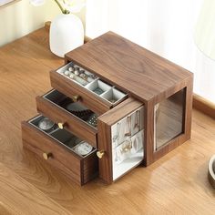 two drawers are open on a wooden table