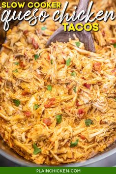 a slow cooker filled with shredded chicken and vegetables