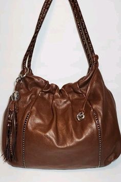 Elegant Brown Bags With Tassels, Chic Brown Hobo Bag With Tassels, Elegant Brown Shoulder Bag With Tassels, Luxury Brown Shoulder Bag With Tassels, Leather Pocket, Studded Leather, Leather Pulls, Silver Studs, Pebbled Leather