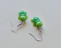 green mini turtle earrings  hypoallergenic and lightweight Clay Turtle Earrings, Cute Handmade Green Jewelry, Handmade Small Green Jewelry, Small Handmade Green Jewelry, Cute Adjustable Green Earrings, Cute Green Jewelry Gift, Summer Green Nickel-free Earrings, Green Jewelry With Matching Earrings For The Beach, Nickel-free Green Earrings For Beach