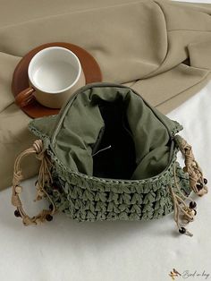 Bird in Bag - Seaside Chic Woven Bag - Bohemian Vibes for Women Casual Woven Hobo Bag In Pouch Shape, Casual Woven Hobo Pouch Bag, Trendy Green Hobo Bag For Beach, Trendy Green Hobo Bag For Vacation, Green Beach Bucket Bag Pouch, Green Pouch Bucket Bag For Beach, Green Pouch Bucket Bag For The Beach, Trendy Green Hobo Bag With Braided Handles, Casual Green Pouch-shaped Bucket Bag