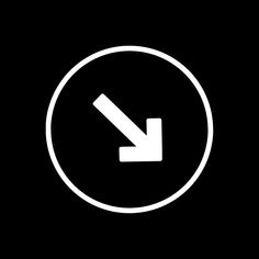 a white arrow in a black circle