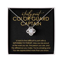 a necklace with an inscription on it that says, i truly great cor guard captain