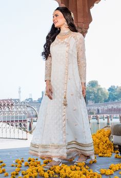 Pakistani Wedding Dress in Angrakha Frock Trouser Style Traditional Wear For Reception With Dabka In Organza, Reception Traditional Wear With Dabka In Organza, Bollywood Style Floor-length Anarkali Set For Ceremony, White Semi-stitched Dress For Reception, Transitional Wedding Dress With Intricate Embroidery, Traditional Raw Silk Dress For Reception, Floor-length Gown For Eid Ceremony, Semi-stitched Floor-length Wedding Dress For Ceremony, White Cutdana Dress For Reception